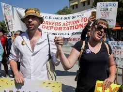 Una manifestación en la ciudad de Nueva York expresó hoy su rechazo a las redadas contra indocumentados. AP/J. Motal