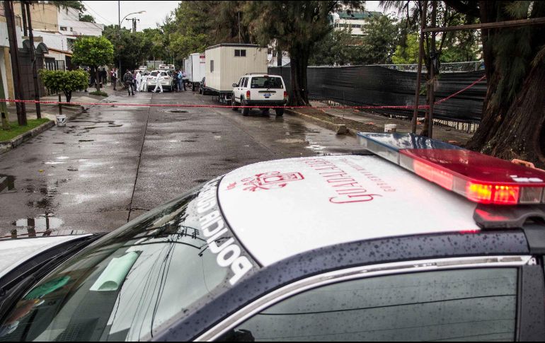 Personal de la Fiscalía del Estado llegó para iniciar con las investigaciones y poder averiguar quiénes fueron los homicidas y las causas de este hecho.  EL INFORMADOR/ ARCHIVO