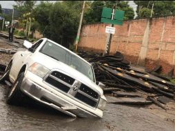 Los daños son visibles en las vialidades de Tlajomulco. TWITTER/@Aleacevesg