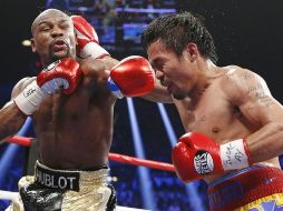 Mayweather ganó por decisión unánime en el 2015, cuando Pacquiao dijo que una lesión en el hombro le impedía estar al 100 por ciento. AP / ARCHIVO