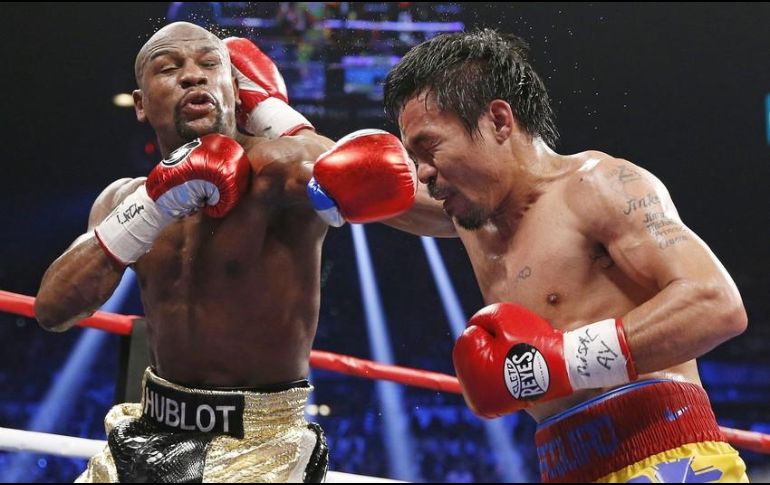 Mayweather ganó por decisión unánime en el 2015, cuando Pacquiao dijo que una lesión en el hombro le impedía estar al 100 por ciento. AP / ARCHIVO