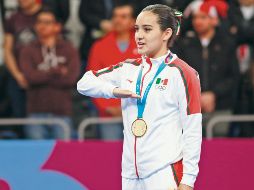 Paula Fregoso consiguió la presea dorada en a modalidad de poomsae. NOTIMEX