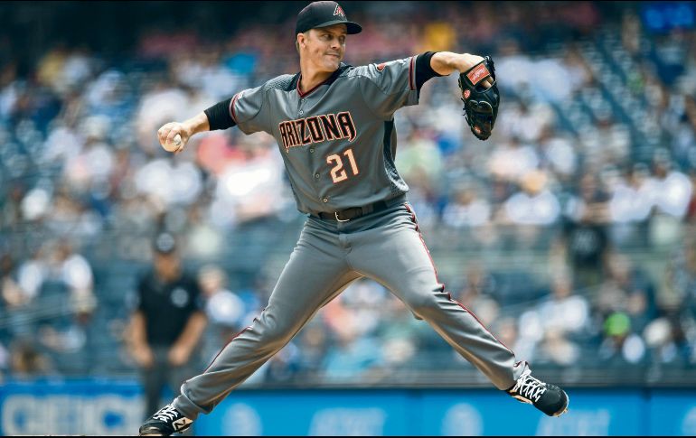 Zack Greinke lanzó ayer su último juego con Arizona. AFP