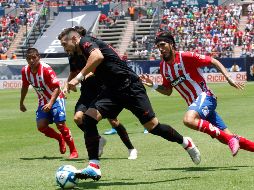 Una de las participaciones más esperadas del encuentro fue la de Héctor Herrera (c). EFE/G. Becerra