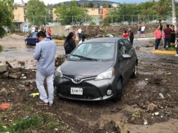 Zonas de la ciudad aún padecen los estragos de la fuerte tormenta de ayer domingo. TWITTER / @PCJalisco