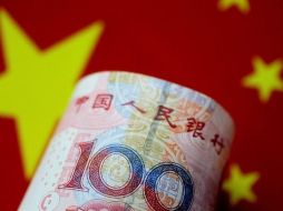 El Banco Popular de China ha dejado caer el yuan un 1.4% frente al dólar. GETTY IMAGES