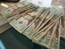 El tipo de cambio para solventar operaciones denominadas en moneda extranjera pagaderas en el país se ubica en 19.6953 pesos. EL INFORMADOR / ARCHIVO