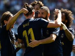 Apenas a los 12 minutos, el francés Karim Benzema adelantó a los merengues cuando remató a placer una asistencia de Gareth Bale. AFP / M. Riopa
