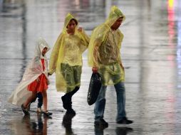 El SMN exhorta a la población en general a extremar precauciones en las zonas de los estados mencionados por lluvias, viento y oleaje. NTX / ARCHIVO