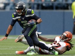 Wilson completó 14 de 20 envíos para 196 yardas y dos touchdowns. AP / S. Brashear