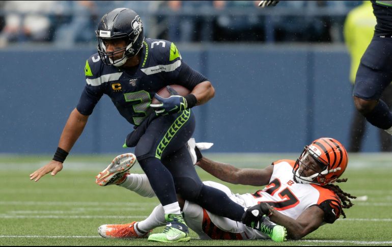 Wilson completó 14 de 20 envíos para 196 yardas y dos touchdowns. AP / S. Brashear