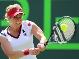 ''Durante siete años he sido madre a tiempo completo y realmente me encanta. Pero también me gustó ser una jugadora profesional. Y echo en falta esa sensación'', dice la jugadora belga. AFP / ARCHIVO