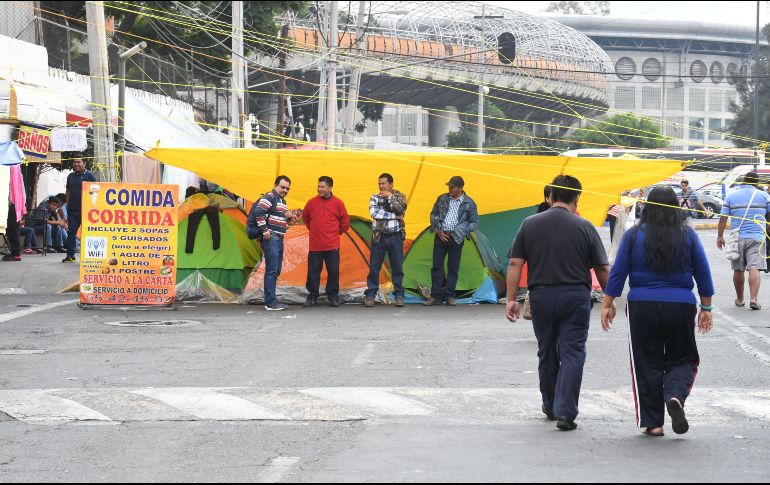 Poco después de las 14:00 horas se permitió la apertura de una puerta del inmueble. SUN
