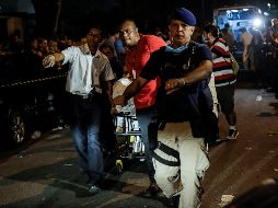 El Cuerpo de Bomberos de Río de Janeiro no precisa si las víctimas son pacientes o trabajadores, ni las causas del incendio en el hospital Badim. EFE / A. Lacerda