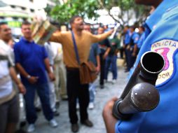 Human Rights Watch afirma que la Policía y las fuerzas de seguridad han dado muerte a casi 18 mil personas en Venezuela. AFP/Archivo