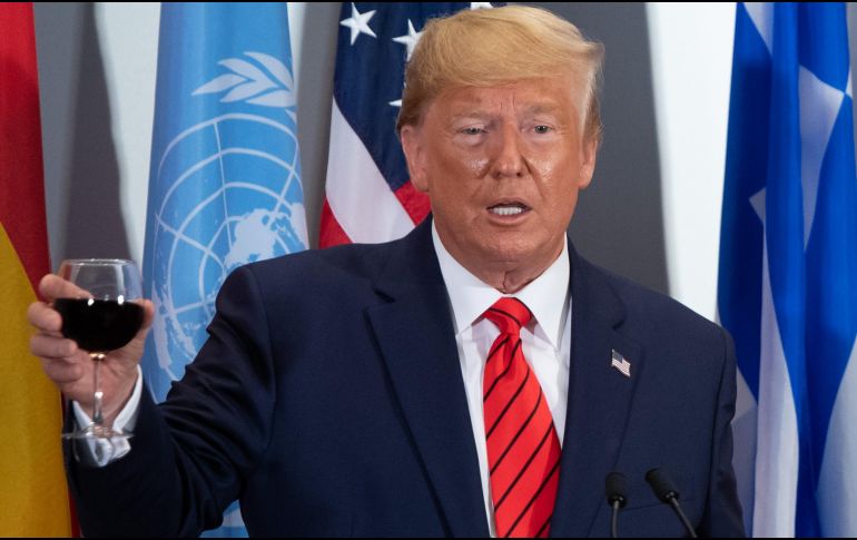 Acusan a Trump de intentar reclutar ilegalmente a un país extranjero para que le ayude en su reelección haciéndole daño a su rival. AFP/S. Loeb