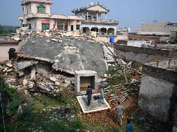 La mayoría de los decesos se produjeron en el distrito de Mirpur, la zona más golpeada por el terremoto la tarde de ayer. AFP / A. Qureshi
