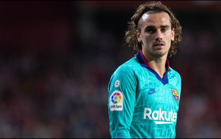 El conjunto catalán no ''notificó por escrito y con antelación'' al Atlético sus conversaciones con el jugador, lo que habría llevado a la sanción económica, al considerarlo una falta leve. AFP / ARCHIVO