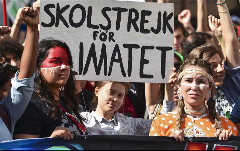 La marcha multitudinaria arrancó a primera hora de la tarde en el centro de la capital de Quebec, en medio de una atmósfera festiva. AFP/M. Panagiotakis