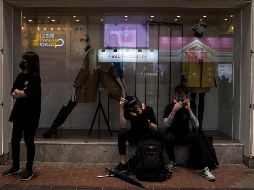 Desde junio, muchos manifestantes empezaron a usar máscaras en las movilizaciones para evitar ser identificados y que se abran diligencias contra ellos. AFP/ F. Dana