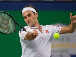 Federer, segundo en las preferencias y número tres del ranking de la ATP, venció por parciales de 7-6 (9/7) y 6-4 a Goffin en una hora y 55 minutos. AFP / N. Celis