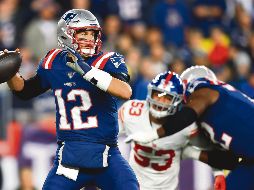 Tom Brady. El quarterback de Nueva Inglaterra colaboró con dos touchdowns en seis acarreos para la victoria de su equipo. AFP