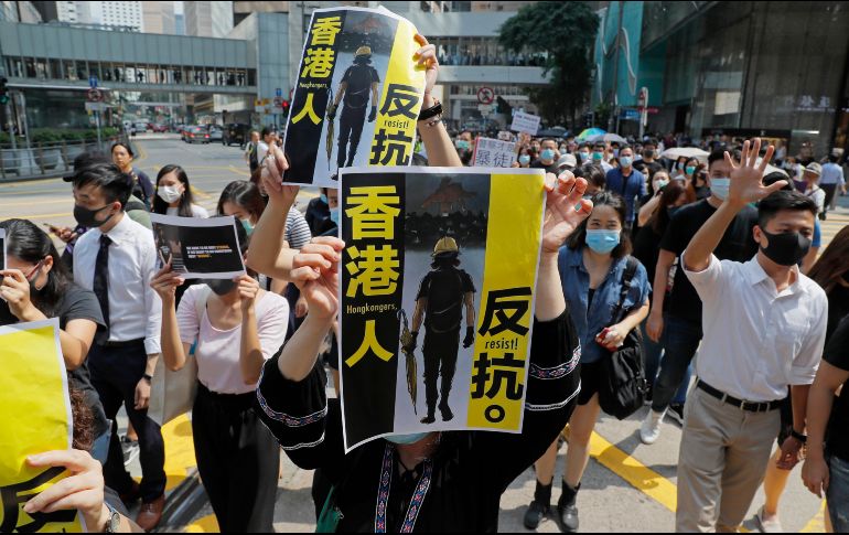 Los manifestantes se concentraron en el parque Chater Garden, donde ocuparon la vía principal e interrumpieron el tráfico de manera pacífica. AP/K. Cheung