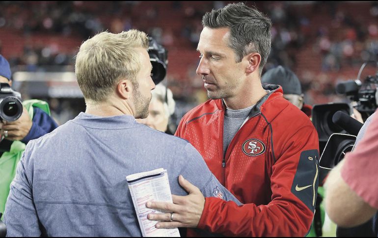 Kyle Shanahan (der.) y Sean McVay (izq.) han revolucionado a sus respectivos equipos, que se disputan la supremacía de la NFC Oeste. AFP