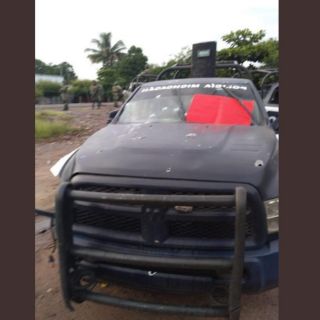 Deja 14 muertos emboscada contra policías en Aguililla, Michoacán