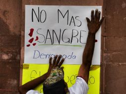 Mediante comunicado, el presidente municipal lamenta la emboscada ocurrida en la tenencia de El Aguaje, en la que fueron asesinados 13 policías y nueve más lesionados. AFP / A. Estrella