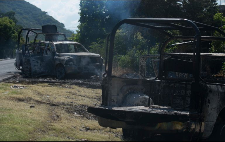 El ataque dejó 13 policías muertos y nueve más lesionados en la comunidad de El Aguaje, municipio de Aguililla, al supuestamente cumplimentar el mandato de un juez. AP / A. Solis