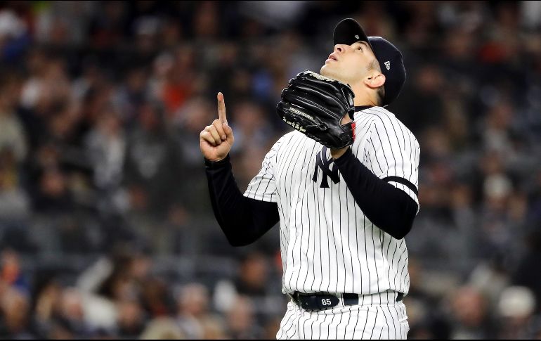 Cessa debutó en juegos de postemporada y lanzó por Yankees. AFP / ARCHIVO
