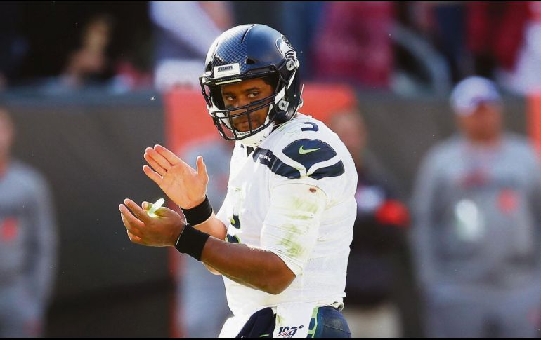 Russell Wilson luce hasta el momento como uno de los candidatos más sólidos a llevarse el premio al Jugador Más Valioso. AFP/G. Shamus