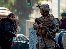El gobierno chileno reforzará la presencia militar en las comunas de Catemu y Olmué, principales focos de incendios provocados esta madrugada y en la noche del domingo. AFP / P. Ugarte