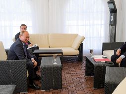 Vladimir Putin (i) y Recep Tayyip Erdogan hablan en su reunión en una residencia del balneario ruso de Sochi. AP/Servicio de Prensa Presidencial