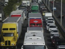 El diputado añade que la legislación local acatará las normas federales sobre el funcionamiento del transporte de carga y su clasificación por pesos y dimensiones. EL INFORMADOR / ARCHIVO