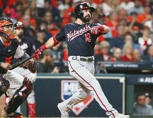 Adam Eaton, de los Nacionales, conectó jonrón productor de dos carreras en el octavo rollo. AFP