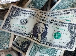 Se espera que el tipo de cambio cotice entre 19.00 y 19.15 pesos por dólar. AFP / ARCHIVO