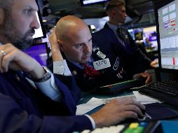 El NYSE Composite muestra un descenso de 29.73 puntos al operar en 13 mil 089.18 unidades. AP / R. Drew