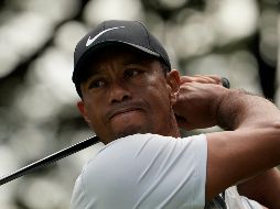 Tiger Woods continuó con el buen juego a pesar del día de descanso y se encuentra por segundo día consecutivo en lo más alto del tablero. AP / L. Jin-man