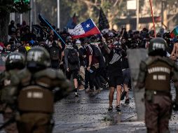 El presidente Sebastián Piñera canceló los planes de hospedar el evento entre el 2 y el 13 de diciembre, junto con los planes de organizar una cumbre de la APEC, debido a los disturbios. AFP / P. Ugarte