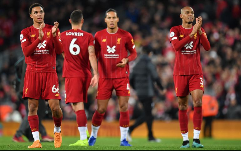 La carga de partidos obligará al conjunto de Jürgen Klopp a utilizar dos equipos diferentes para las dos competiciones, según anunciaron en un comunicado. AFP / ARCHIVO