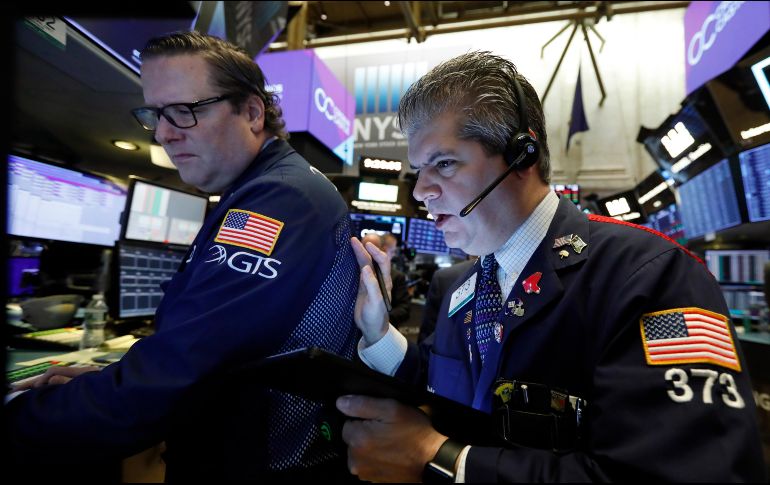 El NYSE Composite muestra una baja de 26.68 puntos al colocarse en 13 mil 368.87 unidades. AP / R. Drew