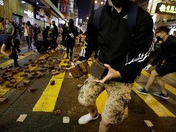 El territorio semiautónomo chino lleva seis meses de protestas, iniciadas por una propuesta para modificar la ley de extradiciones. AP / D. Alangkara