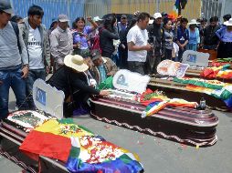 Tres de los fallecidos en los enfrentamientos tienen disparos en la nuca. AFP