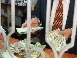 La moneda se adquirió en un mínimo de 18.78 pesos en sucursales capitalinas. EL INFORMADOR/ARCHIVO