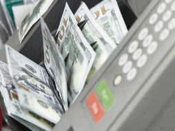 El peso tendrá ligera caída contra el dólar, estiman asesores financieros. EL INFORMADOR