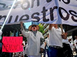 Ciudadanos participaron en la movilización de anti festejo del primer año del gobierno de López Obrador. AFP / C. Ruíz