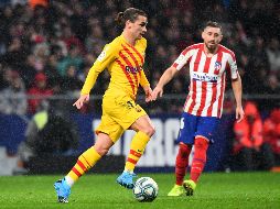 Griezmann fichó por los catalanes en la última ventana de traspasos pagando su cláusula de rescisión de 120 millones de euros al Atlético. AFP / ARCHIVO