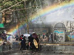 Anti-government protesters clash with the police during protest in Sa